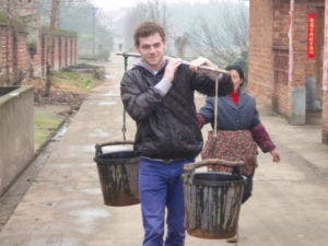 A friend Tom from UK who travelled in rural China to working at a local form