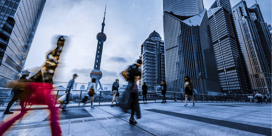 pedestrians walking in shanghai- find a job in china